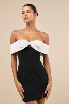 Simply captivate any room you walk into with a mesmerizing look like the Lulus Extravagant Moment Black and White Off-the-Shoulder Mini Dress! This stretchy crepe knit dress starts with a white, satin bow-shaped overlay that creates a chic off-the-shoulder neckline that has hidden no-slip strips and continues into short sleeves (with elastic at the shoulders). Seamed bodice with a dainty keyhole cutout at the center and a fitted waist sits atop a figure-flaunting bodycon skirt that finishes at a Black Hoco Dress With Sleeves, Short Black And White Wedding Dress, Black And White Off Shoulder Dress, Short Off Shoulder Wedding Dress, Black Dress White Trim, Uga Outfits, One Shoulder Hoco Dress, Black Dress For Funeral, Homecoming Dresses Off The Shoulder