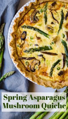 spring asparagus and mushroom quiche on a plate with asparagus spears