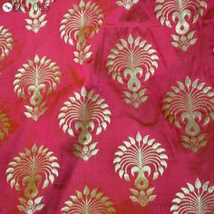 Indian fabric Magenta Brocade Fabric by the yard Banaras Brocade for Bridal Wedding Dress Banarasi Fabric Blended Silk brocade for lehenga. This is a beautiful benarse blended silk brocade floral motifs design fabric in Iridescent Magenta, Yellow and Gold.  ➤Product: Brocade Fabric ➤Fabric Type: Blended Silk (Viscose and Silk) Fine quality Zari Brocade Weaving from Banaras ➤Color: Magenta, Yellow and Gold ➤Width: 43 inches. ➤Condition: New ➤Code: bg1065 ➤Listing for 1 Yard of fabric. ➤Care: Dry Clean Only You can use this fabric to make Dresses, Tops, Blouses, Jackets, Crafting, Clutches or Evening Bags, Embellish your clothes, Pillows, Drapery, Home Décor, Outdoor, Quilting, Sewing, General, Upholstery etc use it for scrap booking projects. If you purchase more than 1 Yard you will get it Printed Bedsheets, Banarasi Fabric, Motifs Design, Paisley Flower, Silk Cushions Covers, Bridal Wedding Dress, Color Magenta, Dupioni Silk, Silk Cushions