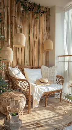 a living room with wicker furniture and plants on the wall next to it's balcony