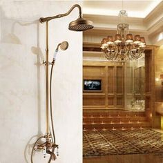 a bathroom with a chandelier and shower head