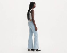 Our 726 High-Rise Flares are designed with a slim fit through your hip and thigh before flaring at the knee. Part of our signature ‘Lot 700’ fits, these jeans are designed to flatter;all day, every day. For those days when skinny jeans won't do Features a waist-defining high rise Finished with a flared leg Authentic denim character enhanced with supersoft stretch. For jeans that'll leave you starry-eyed. That's Levi's® Stellar Stretch. Thanks to excellent built-in recovery, they champion your cu Fitted Flare Jeans With Standard Cut Leg For Spring, High Rise Fitted Light Wash Flares, Light Wash Fitted Straight Leg Flares, Fitted Light Wash Straight Leg Flares, Light Wash Fitted Flare Jeans, Fitted Straight Leg Light Wash Flares, Spring Fitted Flares With Five Pockets, Fitted Light Wash Flare Jeans, Levi's Fitted Light Wash Bottoms