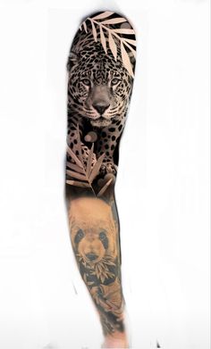 a man with a tattoo on his arm has a bear and leopard design on it