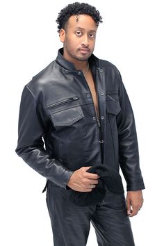 Men's leather jacket with hood that is removable. This men's leather hoodie is not only a motorcycle jacket but a new classic style. A soft lambskin leather motorcycle jacket with dual hidden concealed carry inside pockets, zipper vents on front and back. The soft lambskin leather in this concealed carry jacket with hood is not only comfortable but lightweight. Other premium features include hidden snap heads under the leather, side zippers for sitting comfort, zip and snap cuffs to keep the wind out, rounded mandarin collar, a zip out cotton hood, two snap down lower front pockets, two snap flap chest pockets, full sleeve zip out lining, full front hidden zipper with snap flap cover, two chest zipper vents, horizontal back zipper vent and hidden inside the liner is dual concealed carry ve Fitted Biker Hooded Jacket With Long Sleeves, Fitted Biker Hooded Jacket, Leather Jacket With Double-lined Hood, Leather Biker Jacket With Pockets For Events, Classic Hooded Leather Jacket, Leather Motorcycle Jacket With Pockets, Leather Biker Jacket With Pockets, Leather Biker Jacket With Pockets For Motorcycling, Leather Motorcycling Jacket With Pockets