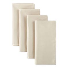 four white napkins on top of each other