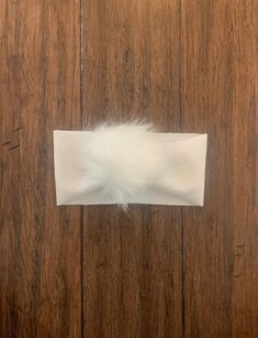 "Our Faux Fur Pom Headbands are created in our Michigan based sewing studio. Each headband is hand cut and hand sewn with attention to detail. Please make your size selection at checkout. Newborn ~ 12-14\" Infant ~ 15-17\" Child ~ 18-20\" Adult 21-23\" Headband measures approximately 4\" wide. Pom measures approximately 3.5-3.9\" wide. Our Pom headbands pair perfectly with our ruffle waist skirts and high waisted bloomers. Do NOT machine wash or dry. Spot clean as needed. 📸 Credit We LOVE to se Cream Outfits, Headband White, Swaddle Sets, White Headband, Velvet Headband, Sewing Studio, Fur Pom Pom, Cool Baby Stuff, Ivory Color