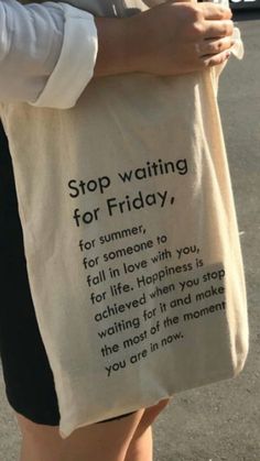 a woman is holding a bag that says stop waiting for friday