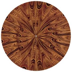 a circular wooden table top with an intricate design