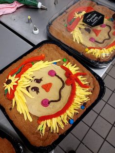 two cakes decorated to look like people's faces