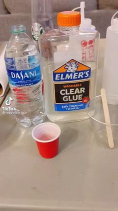 the contents of a disposable water bottle are shown on a counter top