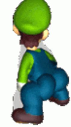 an image of a person sitting on the ground wearing a green hat and blue overalls