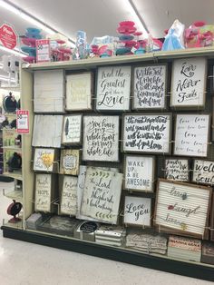 a display in a store filled with lots of greeting cards