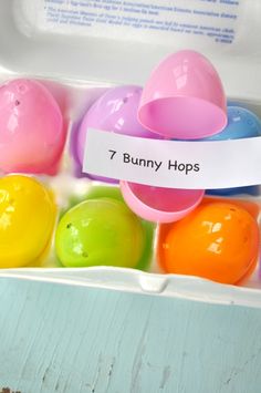 an easter egg box filled with lots of colorful eggs and labeled 7 bunny hops