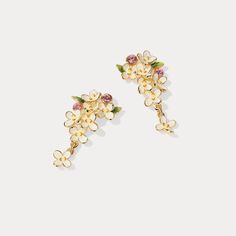 Adorn your ears with these elegant and timeless Osmanthus Fragrans earrings. Crafted with masterful skill and intricate enamel detailing, every unique pair of earrings tells a story of resplendent beauty and refined luxury. DETAILS Plating: 18K Gold Materials: 18K Gold on Brass, Enamel, Silver Size:  1.26"*0.71"(32mm*18mm) Weight:  2.9 g/pr Hypoallergenic design Elegant Enamel Drop Flower Earrings, Elegant Enamel Flower Earrings For Wedding, Gold Enamel Flower Earrings, Gold Enamel Flower Earrings For Wedding, Enamel Drop Flower Earrings, Gold Meenakari Enamel Earrings, Osmanthus Fragrans, Poppy Necklace, Luxury Details