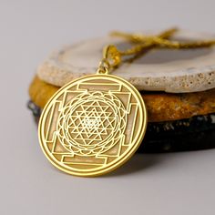 14K Gold Handmade Sri Yantra Necklace - Spiritual Gold Necklace, Sri Yantra Charm Necklace, It can be considered a spiritual gift. Pendant Details 💎 Gold KT: 14K Solid Gold or 8K Solid Gold 💎Gold Color Options: Yellow Gold, White Gold, Rose Gold 💎Thickness: 0.80 mm ✈️ Ready to Ship in 4-7 Business Days ✈️ Transportation is provided by express cargo MORE OF US Pendants and Necklaces: https://goldencastlejewelry.etsy.com NECESSARY INFORMATION 🧡 We provide workshop service in Ankara, we are hap Navratri Brass Jewelry Gift, Brass Necklace As Diwali Gift, Brass Necklace For Diwali Gift, Spiritual Round Pendant Necklaces For Rituals, Handmade Spiritual Necklace For Navratri, Spiritual Yellow Gold Temple Necklace For Rituals, Round Temple Necklace For Navratri Gift, Gold Necklace For Navratri Gift, Handmade Brass Temple Necklace, Spiritual Style