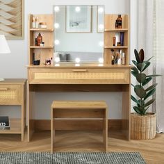 a wooden desk with lights on it and a stool in front of the desk is next to a potted plant