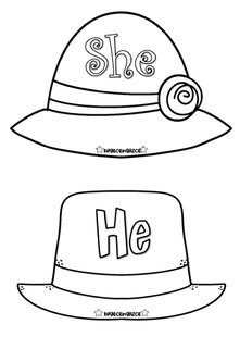 two hats with the words she and he