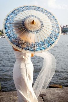 Lovely white and blue paper #umbrella perfect for a summer wedding ceremony...pure charm Baltimore Aquarium, Woman In White, Umbrella Wedding, Acid Wash Jeans, Something Blue, Rainy Days