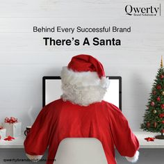 a santa clause sitting in front of a computer with the caption behind him, behind every successful brand there's a santa