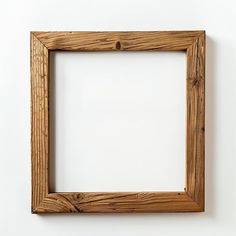 an empty wooden frame hanging on the wall