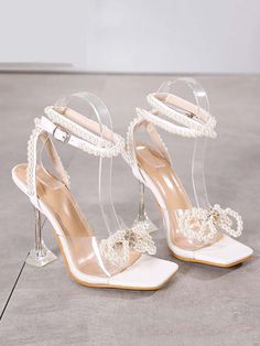 DETAIL Slip-on closure Open toe Rubber outsole PU upper Heel height: 3.15â€?up Glass Heels, Bow High Heels, High Heels Black, Transparent Heels, White Sandals Heels, Pearl Bow, Crystal Sandals, Stunning Shoes, Bow Sandals