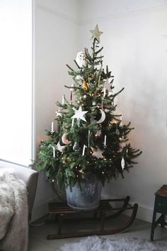 a small christmas tree in a room