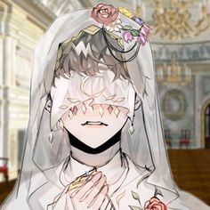 a person in a white wedding dress with flowers on her head and veil over their face