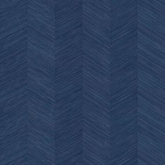 a blue chevroned wallpaper pattern that looks like it has been painted in different shades