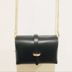 Nwt Trevi Small Black Leather Crossbody Bag On Gold Chain Approximate Dimensions Length: 6.5” Width: 3.5” Height: 4” Strap Drop: 24” Genuine Leather. Made In Italy. Gold Hardware. Removable Gold Chain Strap. New With Tags. Elegant Crossbody Shoulder Bag With Hardware, Black Evening Bag With Hardware, Black Evening Bags With Hardware Details, Black Evening Bags With Hardware, Chic Black Bag With Hardware Details, Classic Black Shoulder Bag With Chain, Elegant Formal Shoulder Bag With Hardware, Leather Shoulder Bag With Gold Chain For Party, Classic Black Bag With Gold Chain