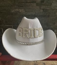 Top off your look with our ladies' cowboy printed hat. Perfect for festivals, western-themed parties, hen nights, and more. Each hat is made from a high-quality polyester blend and comes with an adjustable cord. Party decor for gatherings and celebrations.  Delivery from a small business in the United Kingdom. 💖 Size details: The cowboy hats measures approx 38 x 30 x 13 cm (14.96 x 11.81 x 5.11 inches) with an adjustable elastic rope, which can fix the hat on the head. It is safe, convenient, and suitable for most children. 💖 Quality material: The hat is made of felt, which is lightweight, breathable, durable, sturdy, not easy to deform, and comfortable to wear. 💖 Crown design: The hat adopts personalised designs and is accented by a sparkling princess crown and sequin trim. It glitters White Western Costume Hats And Headpieces, Western White Costume Hats For Country Events, Western White Costume Hats And Headpieces For Summer, White Western Costume Hats And Headpieces For Summer, Western White Costume Hats And Headpieces For Rodeo, White Western Costume Hats And Headpieces For Themed Events, White Western Costume Hats For Themed Events, Fitted Wide Brim Costume Hats For Country Events, Western Costume Hats And Headpieces For Country Events