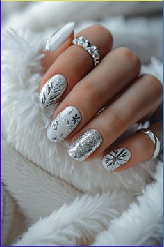 Get ready for the winter season with these stunning winter nail designs! From cozy and festive holiday nails to chic and elegant winter nail ideas, we've got you covered. Whether you prefer bold and vibrant colors or icy pastels, there's a design here to suit everyone's taste. Embrace the beauty of winter with these eye-catching nail looks that will make a statement wherever you go. Stay trendy this season with our collection of winter nails that are sure to inspire your next manicure! Winter Theme Nails, Short Winter Nails, Nail Designs Winter, Theme Nails, Festive Holiday Nails, Festive Nail Designs, New Years Eve Nails, Pink Ombre Nails, Minimalist Nail Art