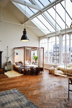 an instagramted photo of a bedroom with a canopy bed