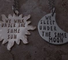 two necklaces that say we walk under the same sun and sleep under the same moon