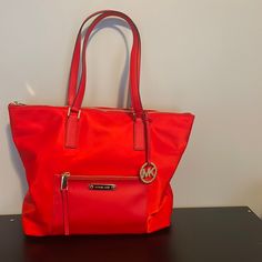 Beautiful Purse Used Maybe Once. Waterproof Material With Leather Straps. No Papers, But Does Come With The Storage Bag And Cross Body Strap. I’ve Included Interior And Close Up Photos To Identify Authenticity. Large Black Purse, Luxury Stuff, Clear Tote Bags, Beautiful Purse, Tan Handbags, Michael Kors Tote Bags, Red Purse, Black Satchel, Carryall Tote