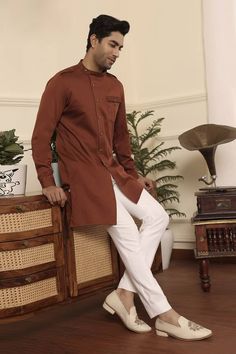 Rust full sleeve kurta with front button placket and asymmetric hem. Paired with pant. - Aza Fashions Casual Long Sleeve Kurta With Dabka, Designer Wear Long Sleeve Bandhgala For Fall, Long Sleeve Cotton Bandhgala For Eid, Fall Bandhgala With Long Sleeves, Casual Long Sleeve Brown Kurta, Fitted Long Sleeve Nehru Jacket For Semi-formal Occasions, Casual Brown Long Sleeve Kurta, Cotton Kurta For Work With Long Sleeves, Formal Cotton Nehru Jacket With Long Sleeves