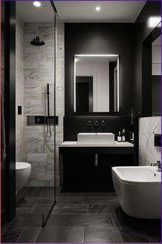 a black and white bathroom with two sinks, a bathtub and a shower head