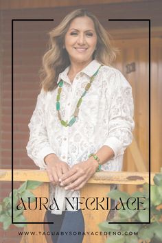 Woman in a white lace blouse smiles warmly in front of a brick wall and wooden door. She wears a green and gold necklace and bracelet. Text reads "Aura Necklace." Aura Necklace, Eco Friendly Jewelry, Adjustable Necklace, Cotton Cord, Waxed Cotton, Long Necklace, Handmade Necklaces, Jewelry Pieces