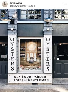 an advertisement for oysters on the side of a building