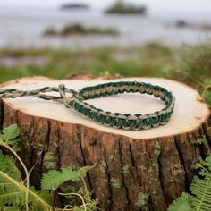 Embrace earthy tones with this handmade sage green hemp bracelet. Perfect for surfers and boho lovers, it’s crafted from natural eco-friendly materials. This adjustable bracelet offers a relaxed beach style, ideal for casual wear or gifting someone special who loves nature-inspired, sustainable fashion.Material: natural hempWidth: about 1/2 inch (10-12cm)Color: Sage green and naturalLength: 6 inch or custom Closure: braided loop and ties closure, make the bracelet more adjustable . If you want y Handmade Green Bohemian Braided Bracelets, Handmade Green Bohemian Braided Bracelet, Rustic Green Adjustable Jewelry, Green Bohemian Bracelets With Adjustable Cord, Green Macrame Bohemian Bracelets, Green Bohemian Macrame Bracelets, Green Bohemian Bracelet With Waxed Cord, Bohemian Green Waxed Cord Bracelets, Green Braided Bohemian Jewelry