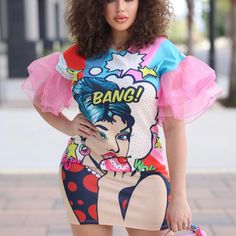 Final Sale! Sublimated Pop Art Short Dress With Organza Ruffled Sleeves Fabric Techno & Organza 96% Polyester 4% Spandex Made In Usa Sizes: S(0-2), M (4-6), L (8-10) Playful Short Sleeve Dresses For Brunch, Playful Pink Mini Dress With Short Sleeves, Pink Playful Mini Dress With Short Sleeves, Pink Playful Short Sleeve Mini Dress, Playful Mini Dress For Spring Party, Playful Printed Dress For Day Out, Stretch Mini Dress With Ruffles And Short Sleeves, Playful Spring Mini Dress For Parties, Playful Spring Party Mini Dress