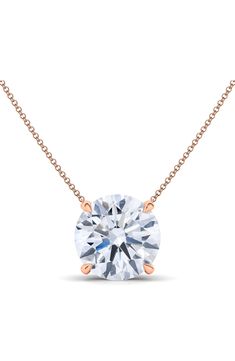 A four-pronged lab-created diamond sparkles from the center of this delicate chain necklace that's crafted from 14-karat gold. Total lab-created-diamond weight: 1.00ct.   Color: D–F   Clarity: VS   14k gold/lab-created diamond   Made in the USA   >Diamond Guide Rose Gold Solitaire Necklace In Cubic Zirconia, Fine Jewelry Rose Gold Solitaire Necklace With Cubic Zirconia, Rose Gold Cubic Zirconia Solitaire Necklace, Rose Gold Round Pendant Diamond Necklace, Dazzling Rose Gold Necklace With Prong Setting, Rose Gold Solitaire Necklace With Diamond Cut Cubic Zirconia, Dazzling Diamond Cut Rose Gold Necklace, Rose Gold Solitaire Necklace With Brilliant Round Cut, Dazzling Rose Gold Diamond-cut Necklace