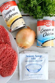 the ingredients to make an easy ground beef soup are displayed on a white plate, including onions, carrots, and cream cheese