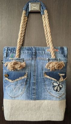 a purse made out of old jeans and rope