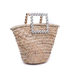 This trend-setting bag is made with woven straw all over, giving it a unique and natural aesthetic. Plus, with golden hardware and a rhinestone handle, you can take your look up a notch while also giving off a sophisticated vibe. And if that wasn’t enough, on the inside you can find 1 zipper pocket and 1 slip pocket for keeping your accessories organized. Chasity is here to make sure you stay fashionable and make a statement wherever you go—it’s time to show off that fun, sassy attitude of yours Elegant Straw Bags With Bamboo Handle, Chic Straw Bag With Gold-tone Hardware And Top Handle, Chic Rectangular Bucket Bag As Fashion Accessory, Chic Straw Bag With Gold-tone Hardware, Chic Top Handle Straw Bag With Gold-tone Hardware, Elegant Vacation Bucket Bag With Bamboo Handle, Chic Straw Bag With Bamboo Handle, Chic Straw Shoulder Bag, Luxury Summer Straw Bag With Round Handle