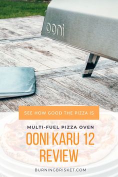 ooni karu 12 sitting next to pizza peel and pizza Pizza Cooking, Made It, Sleek Design, Grilling