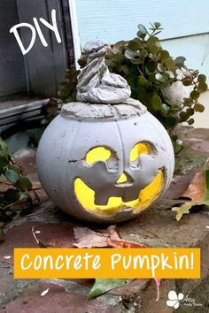 a cement pumpkin with the words concrete pumpkin diy on it's front porch