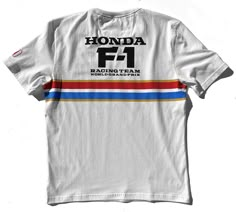 white with red, white, blue and gold stripes - 100% cotton tee - vintage look, modern feel. Inspired by the uniforms worn by Honda F1 Racing Team engineers during the 1986 Formula 1 season. The mighty turbo V6, Honda RA 166E engine produced more than 1000+ hp in qualifying trim, winning 9 out of 16 races delivering Honda and their Grove-based partners the World Constructor's Championship in 1986. All our merchandise is 100% authentic, bespoke and produced under license to our exacting specificat Race Team Shirts, Honda F1, Polo Hat, Aviator Jackets, F1 Racing, Gold Print, Motor Company, Racing Team, Gold Stripes