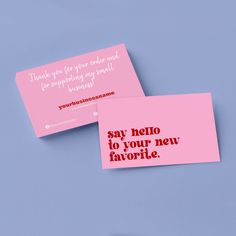 two pink business cards with the words say hello to your new favorite