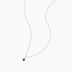 A modern heirloom. Introducing our take on a traditional style. Whether you wear yours or a loved one’s, a birthstone necklace is an easy way to add color and meaning to your look. This birthstone necklace features a 14k gold chain and diamond detail and makes for a perfect, personal gift. Garnet is January's birthstone. Product Details Diamond: 0.01 total carat weight, 1.3 mm GH SI1-SI3 Garnet: 0.15 total carat weight, 3 mm genuine garnet 14k solid gold 16" chain + 2" extender. Adjustable in 1" Fine Jewelry Birthstone Necklace With Delicate Chain, Delicate Chain Pendant Birthstone Necklace, Elegant Birthstone Necklace With Round Pendant On Cable Chain, Gold Dainty Birthstone Necklace With Gemstone Accents, 14k Gold Birthstone Necklace With Round Stone, Yellow Gold Solitaire Pendant Necklace With Birthstone, Dainty Gold Birthstone Necklace With Gemstone Accents, Dainty Birthstone Necklace With Round Stone, Yellow Gold Birthstone Necklace With Delicate Chain