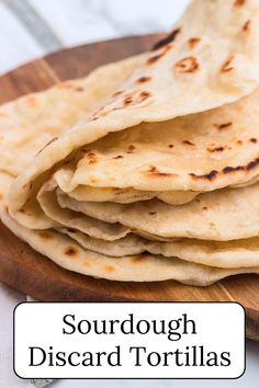 some tortillas are stacked on top of each other with the words, sourdough discard tortillas